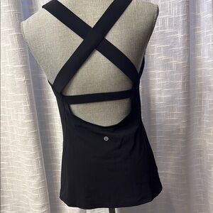 Lululemon black tank with cross-cross back strap.